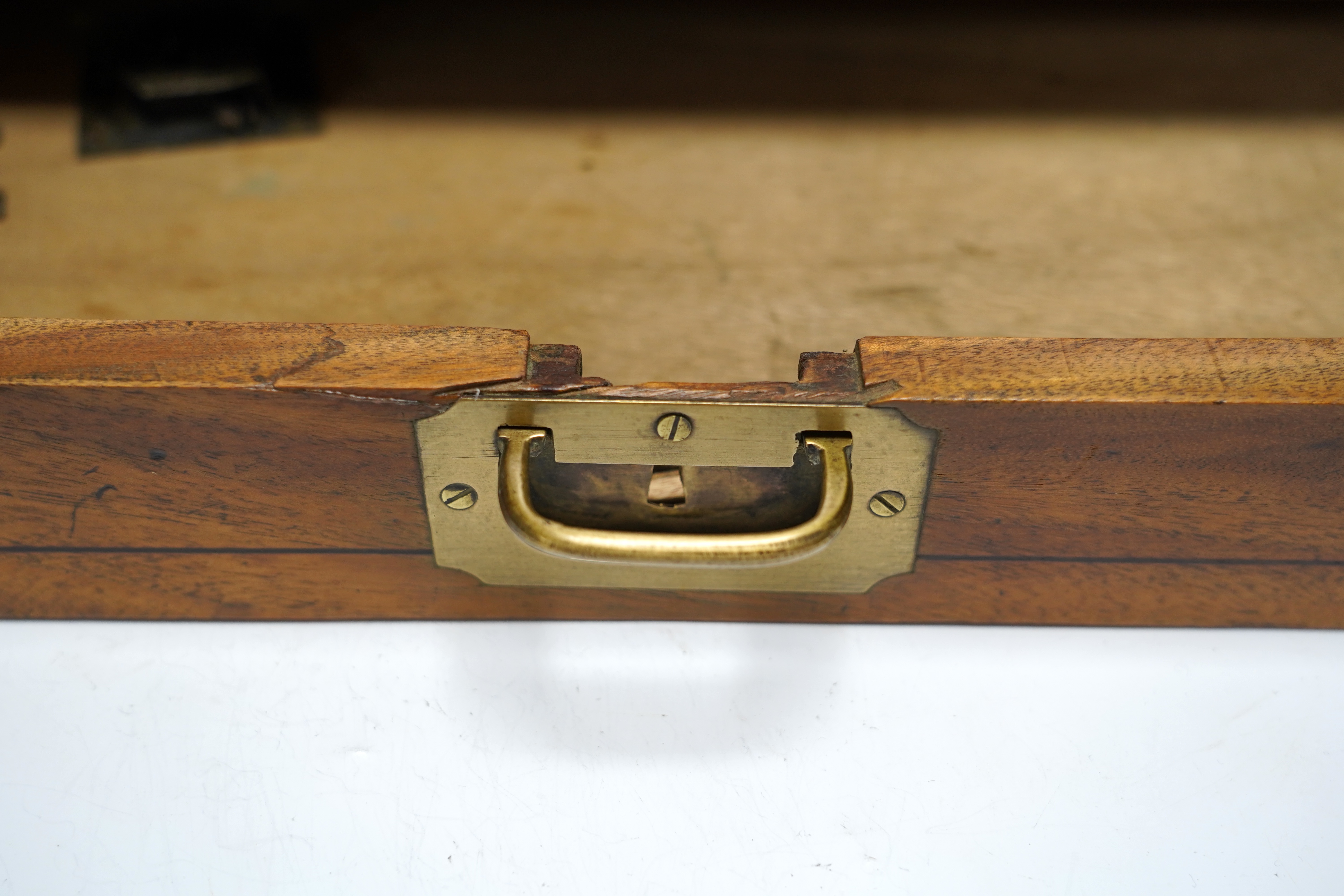 A 19th/20th century Anglo-Indian brass bound camphorwood roll top writing box, 47.5cm wide